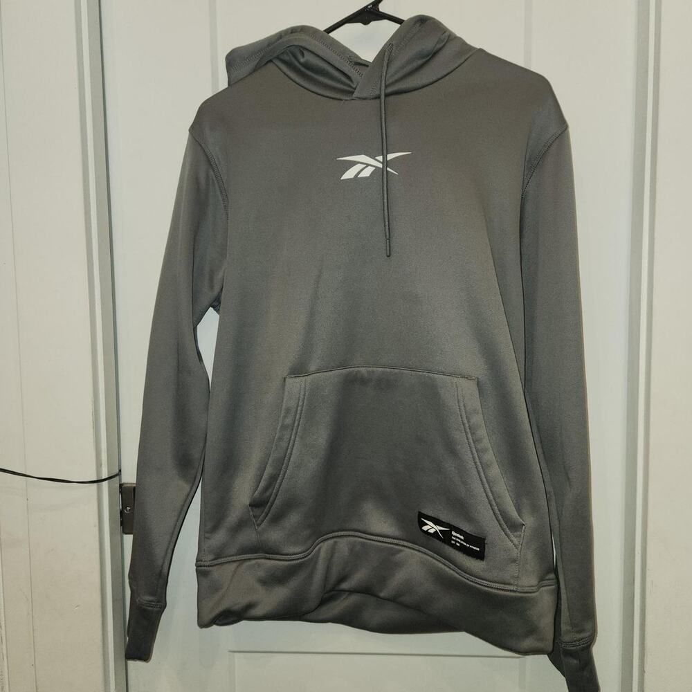 Gray reebok hoodie with white